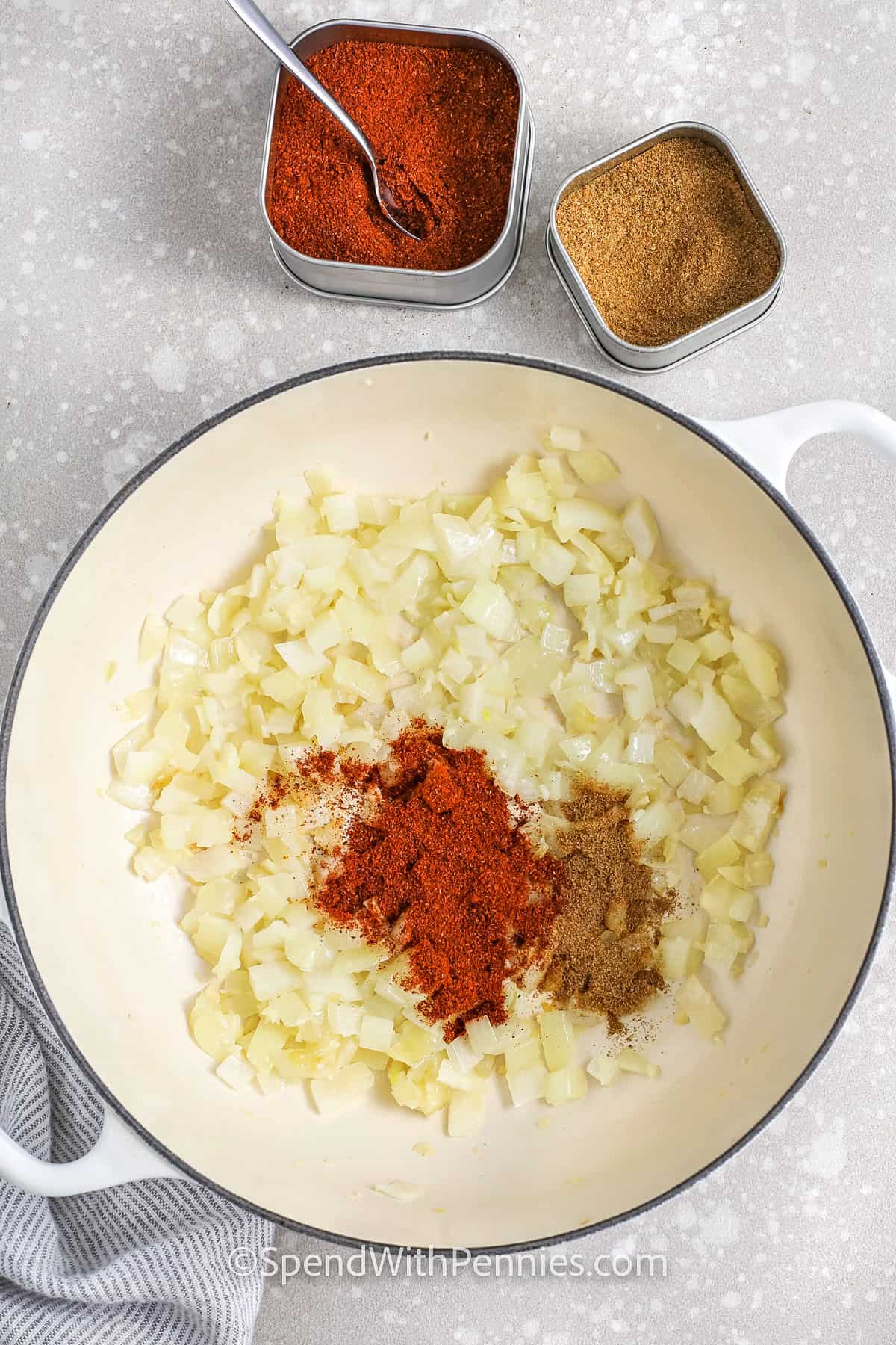 onions and spices in a pot