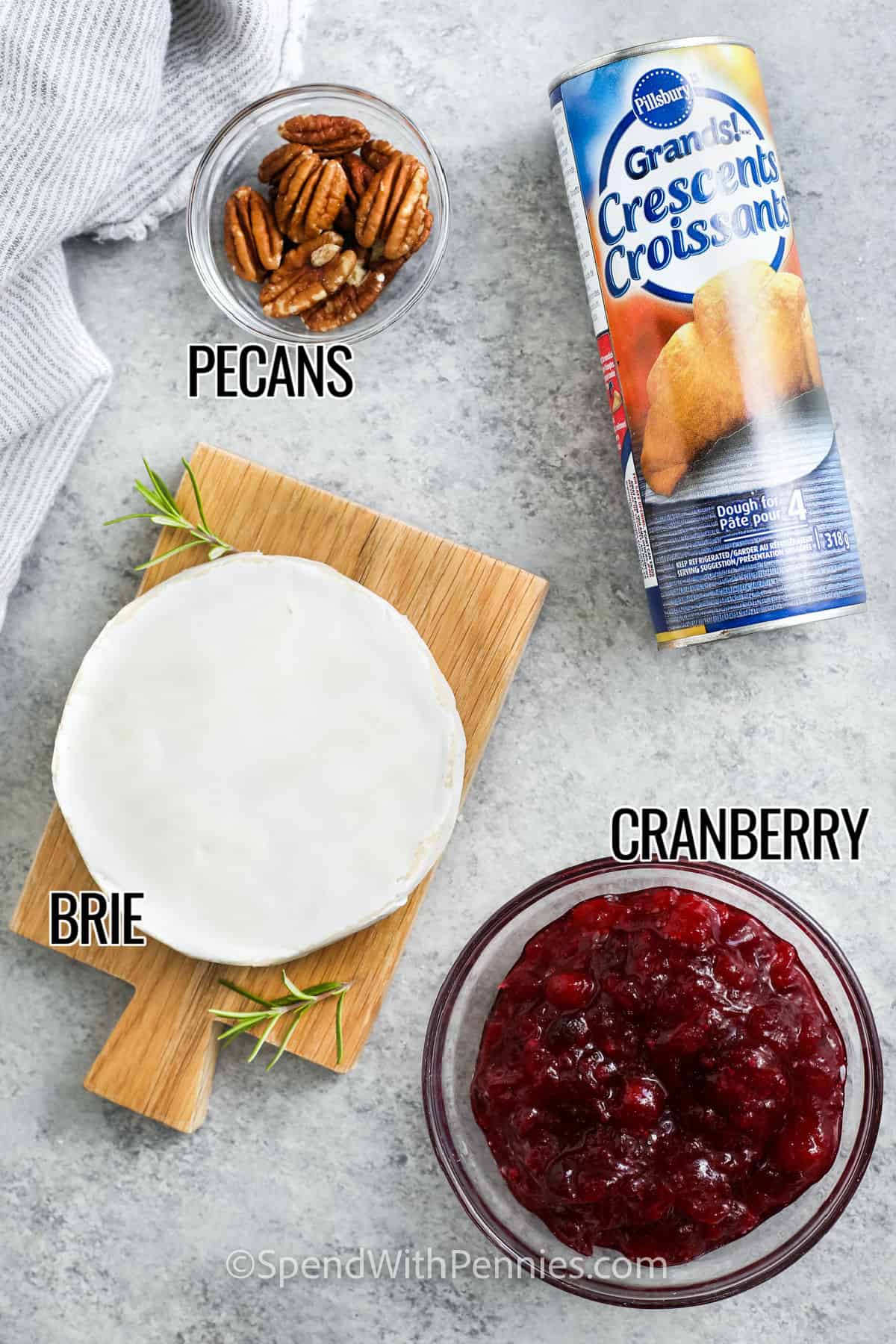 brie , cranberry , pecans and crescent roll dough with labels to make Cranberry Brie Bites