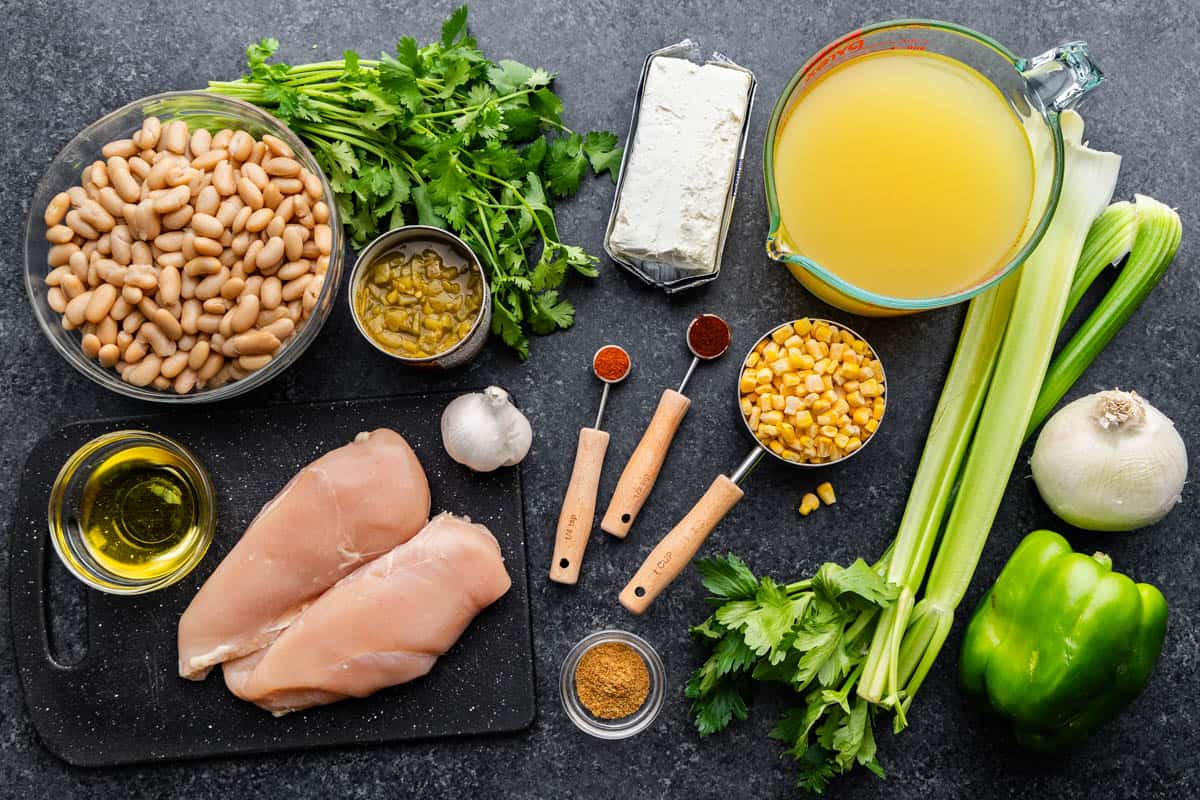 An overhead view of the ingredients needed to make white chicken chili.