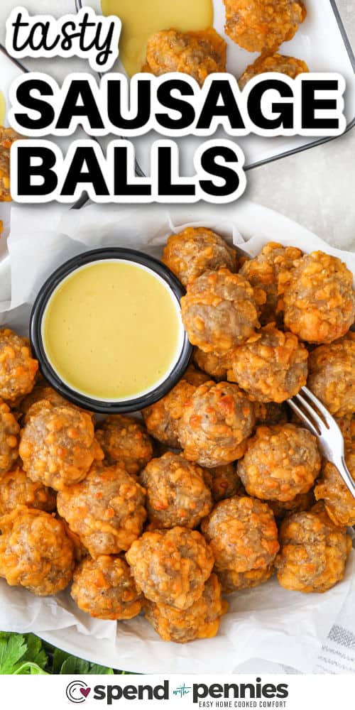 plated Sausage Balls with dip and writing