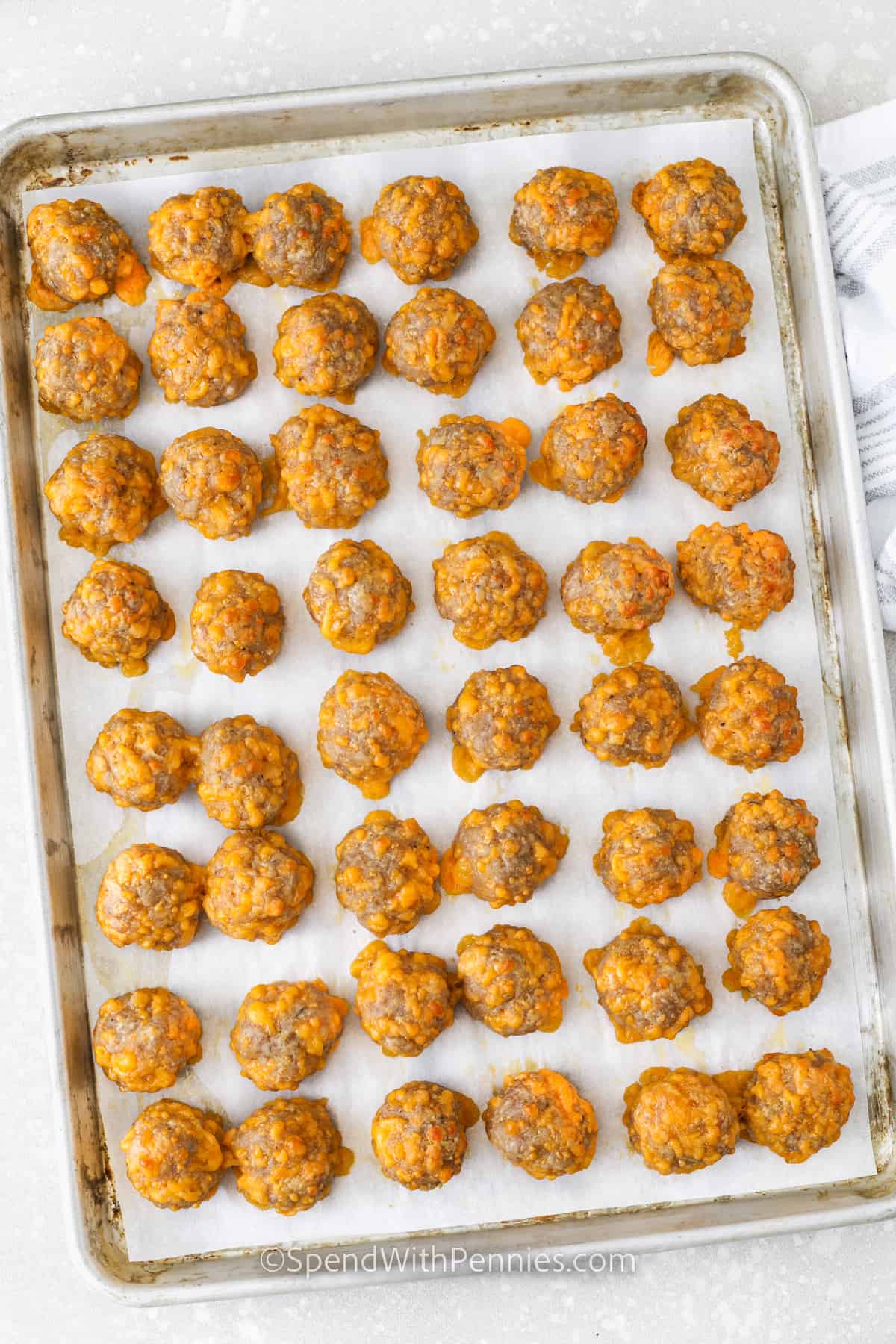 cooked Sausage Balls on a sheet pan