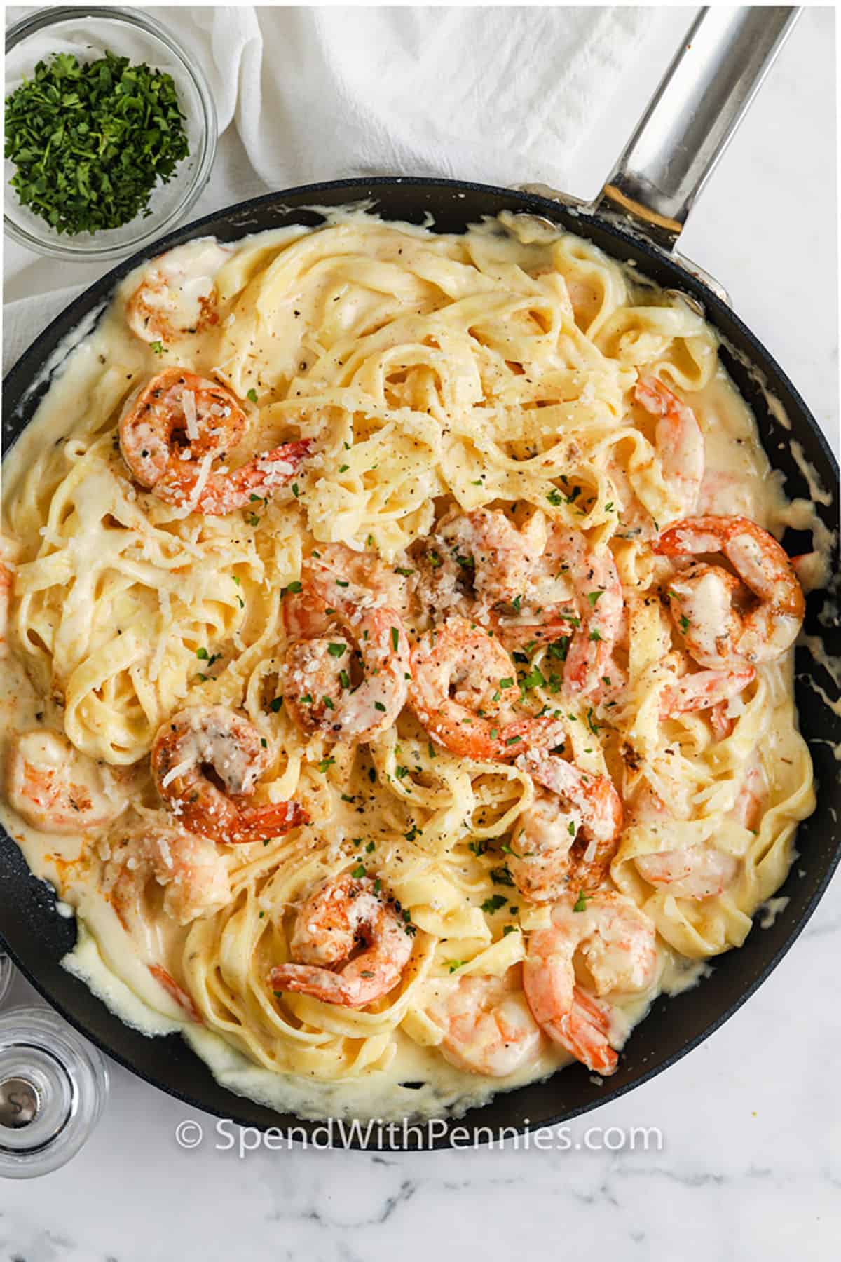 pan full of cheesy Shrimp Alfredo