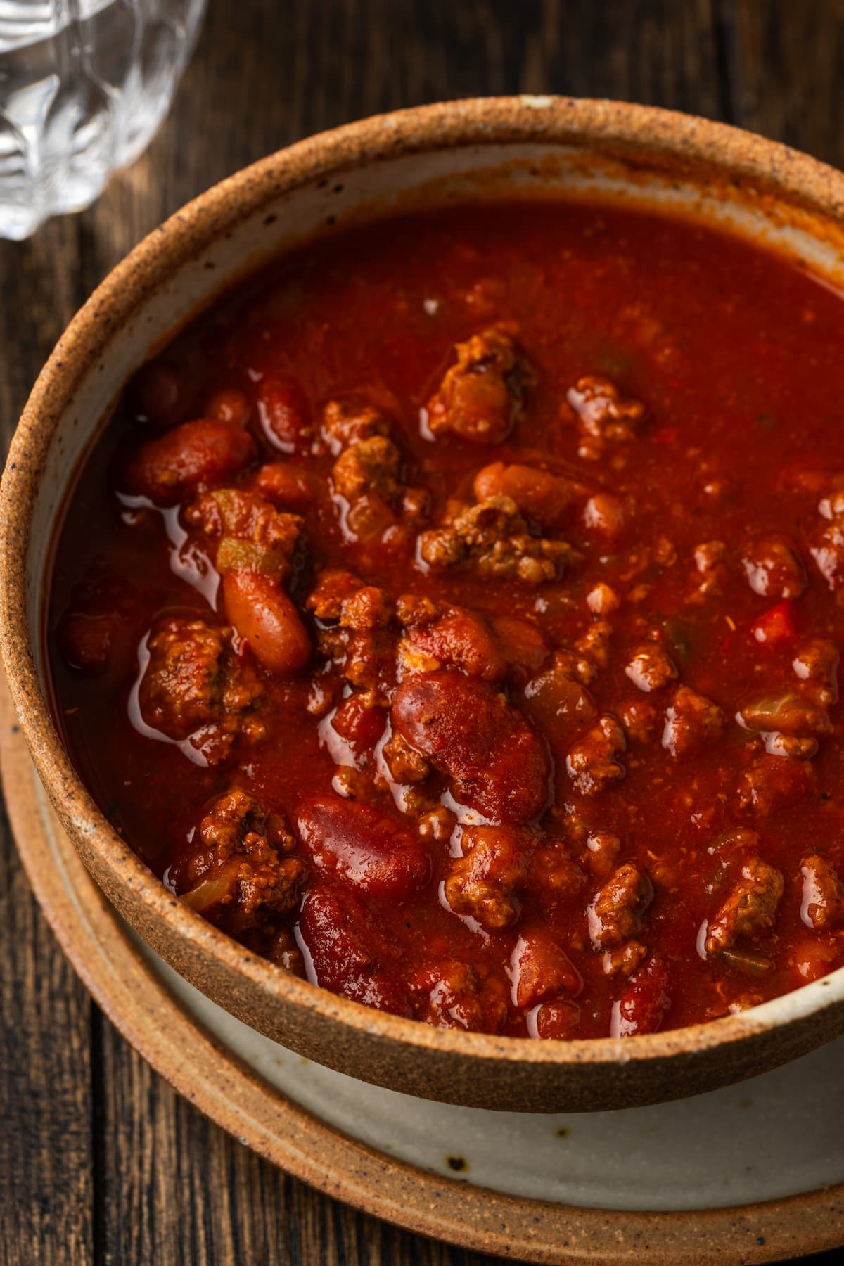 Instant pot chili served in a stoneware bowl.